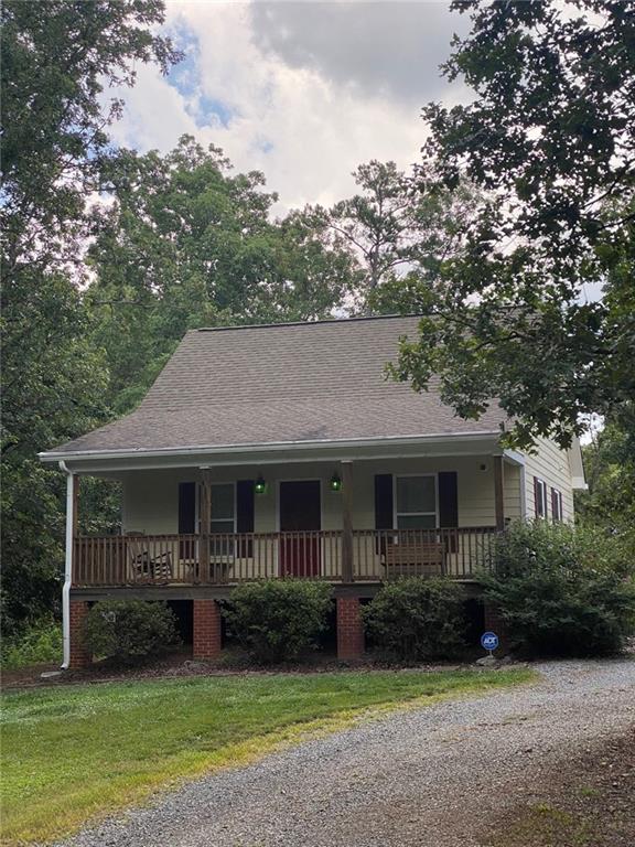 125 Bryant Road Southwest Rome, GA 30161 - Photo 1 of 1 a front view of a house with garden