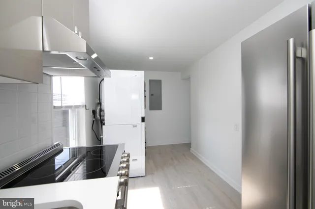 a bathroom with a shower and a mirror