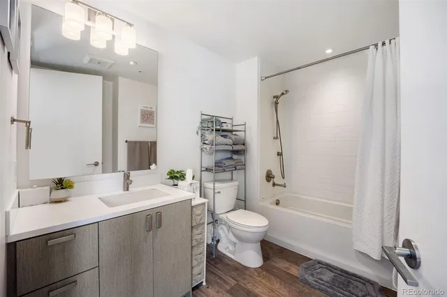 a view of swimming pool with outdoor seating and a projector