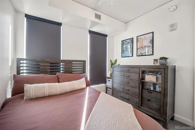 a view of a chairs and table in a patio