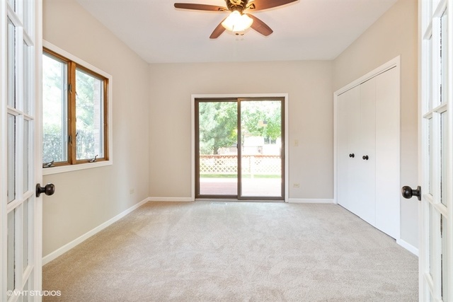 154 Bent Tree Lane New Lenox, IL 60451 - Photo 12 of 25 a view of an empty room with a window