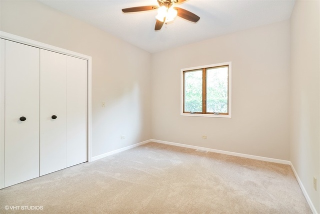 154 Bent Tree Lane New Lenox, IL 60451 - Photo 13 of 25 a view of an empty room with a window