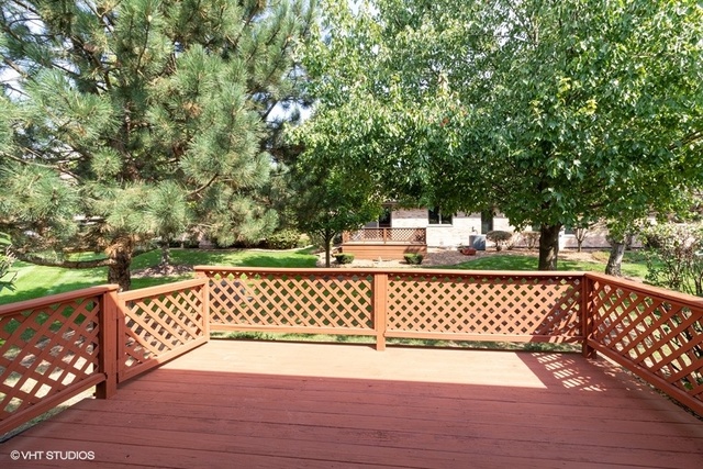 154 Bent Tree Lane New Lenox, IL 60451 - Photo 23 of 25 a view of outdoor space with deck and trees