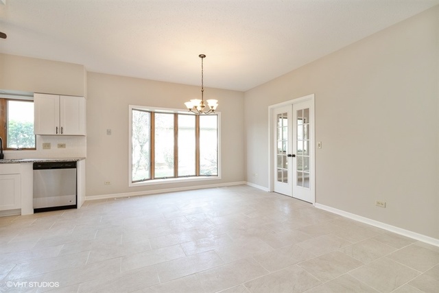 154 Bent Tree Lane New Lenox, IL 60451 - Photo 10 of 25 a view of an empty room with a window