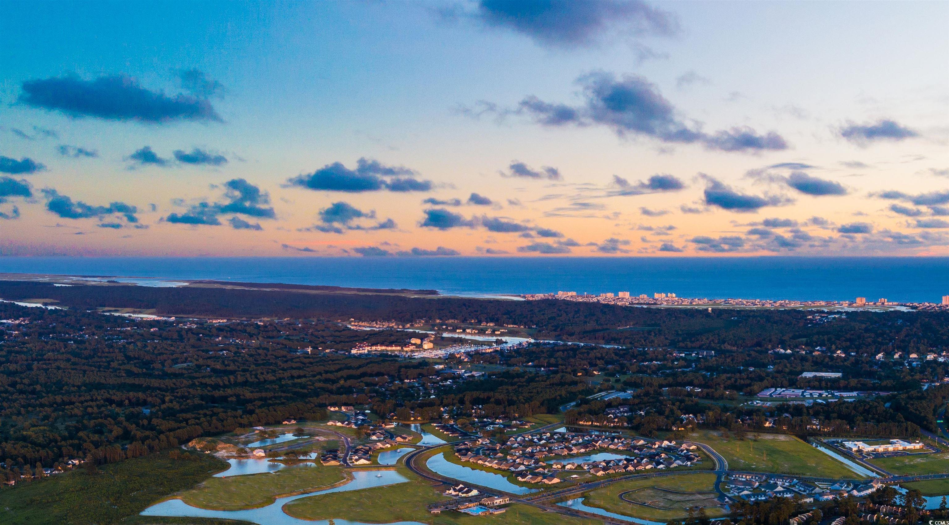 712 St Vincent Loop Little River, SC 29566 - Photo 2 of 10 Aerial overview of property's location featuring a large body of water