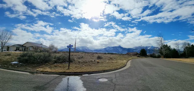 a view of a playground with basketball court