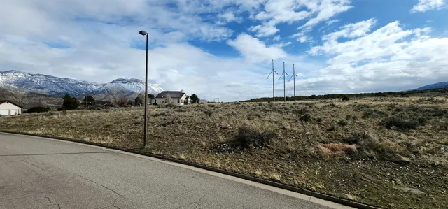 a view of a wooden fence
