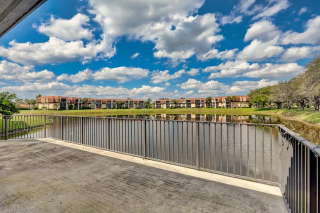 a view of a house with a big yard