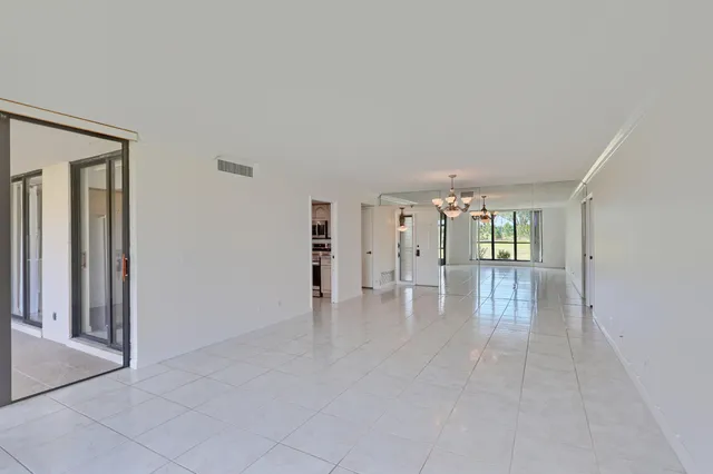 a kitchen with sink cabinets and window