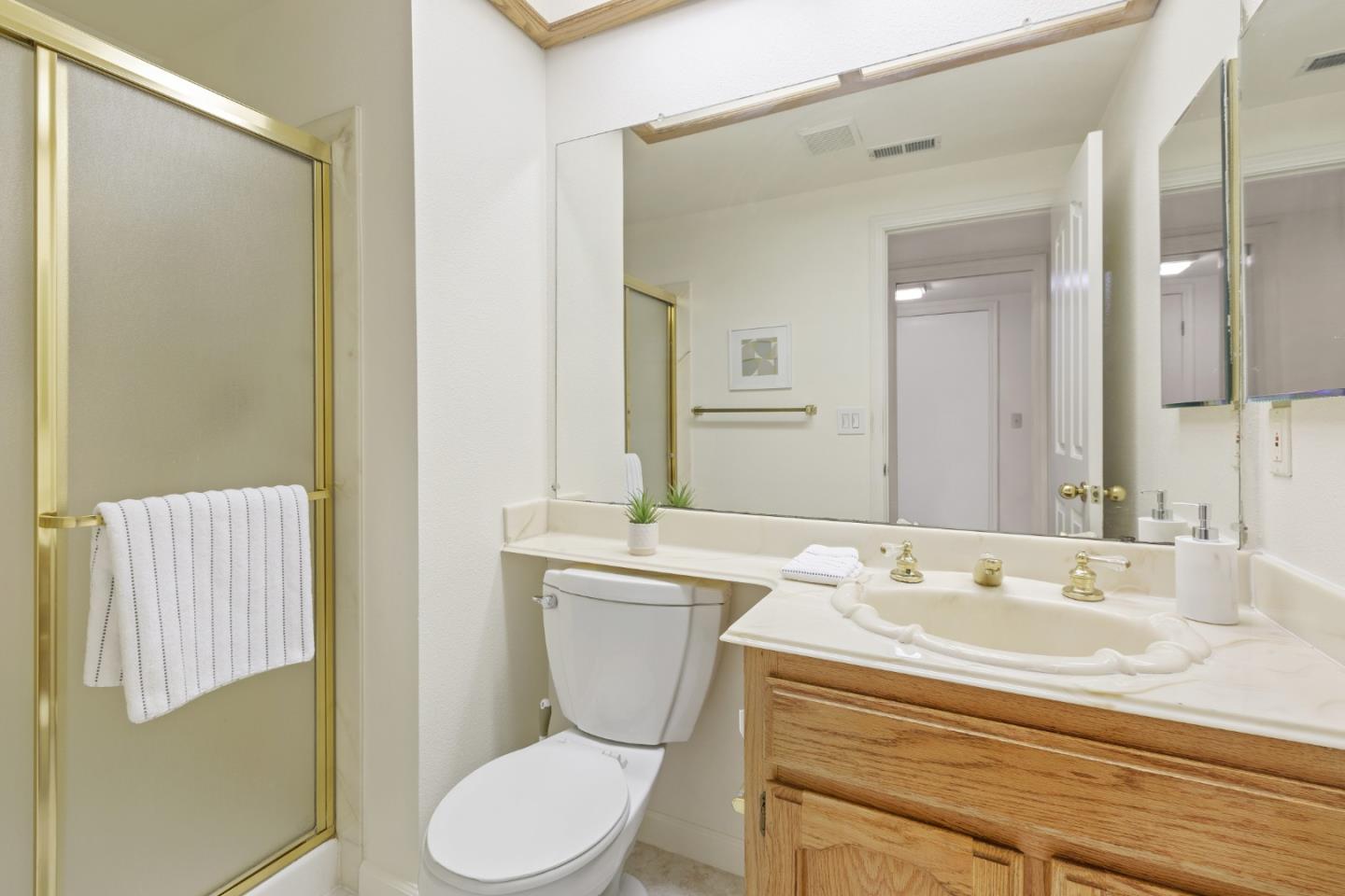 2018 Skyline Drive Milpitas, CA 95035 - Photo 17 of 22 a bathroom with a sink toilet and shower