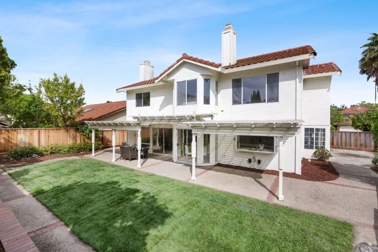 2018 Skyline Drive Milpitas, CA 95035 - Photo 19 of 22 a view of a house with a yard and sitting area