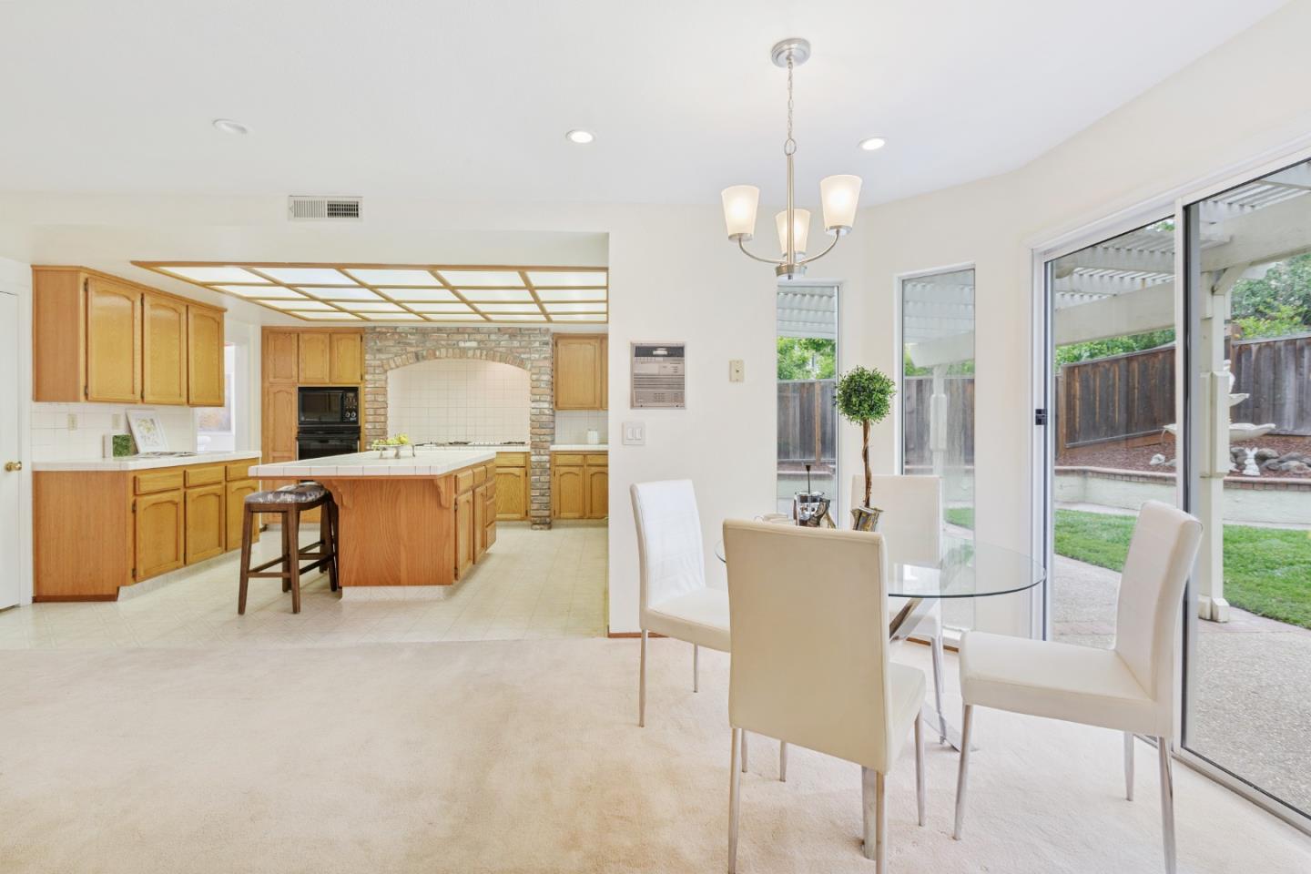 2018 Skyline Drive Milpitas, CA 95035 - Photo 7 of 22 a view of a dining room with furniture window and outside view