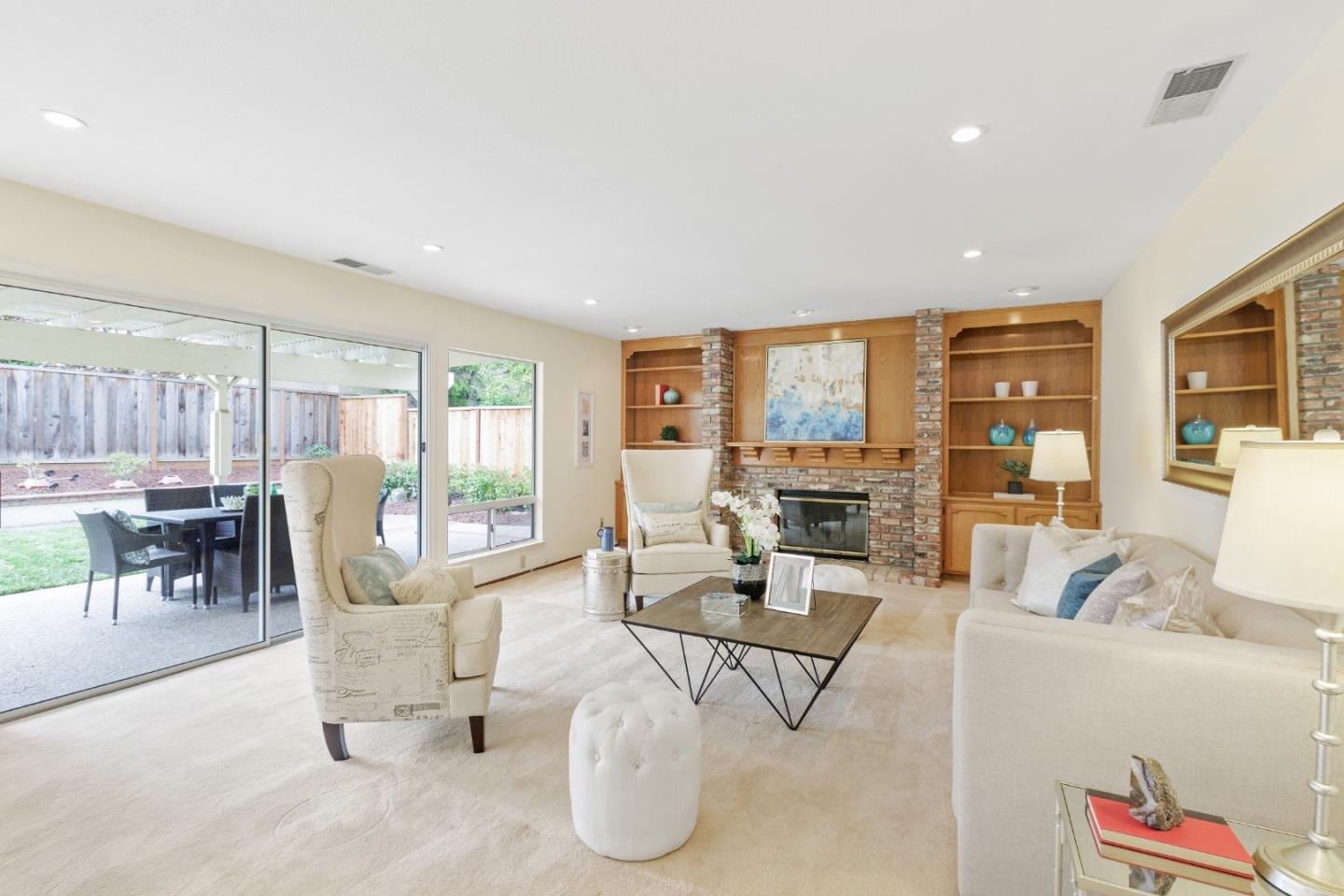 2018 Skyline Drive Milpitas, CA 95035 - Photo 8 of 22 a living room with fireplace furniture and a large window
