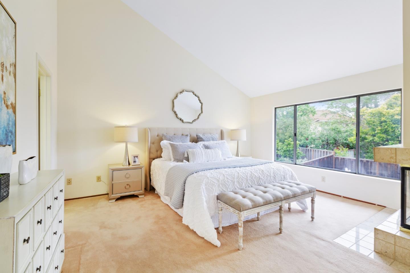 2018 Skyline Drive Milpitas, CA 95035 - Photo 10 of 22 a bedroom with a large bed and a large window