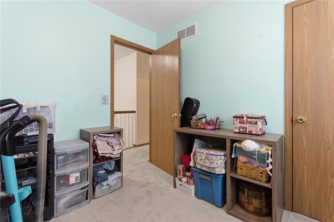 8747 Waynes Way Blanchester, OH 45107 - Photo 11 of 40 This versatile room offers adaptable space for various household needs and activities.