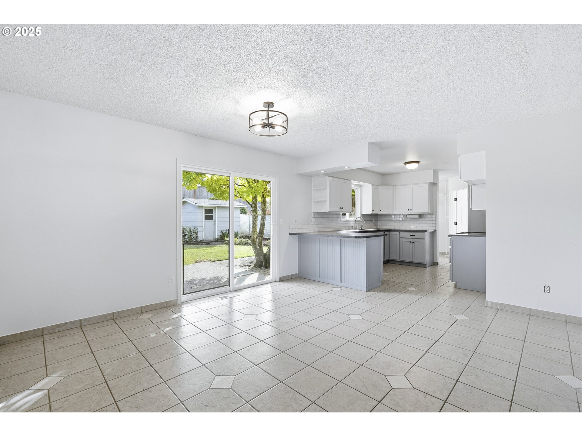 1422 Southeast 209th Avenue Gresham, OR 97030 - Photo 16 of 46 a view of kitchen with furniture and window
