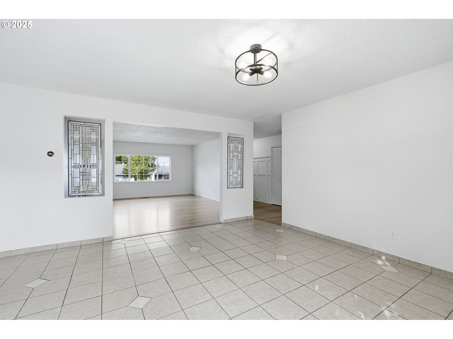 1422 Southeast 209th Avenue Gresham, OR 97030 - Photo 17 of 46 a view of an empty room and window