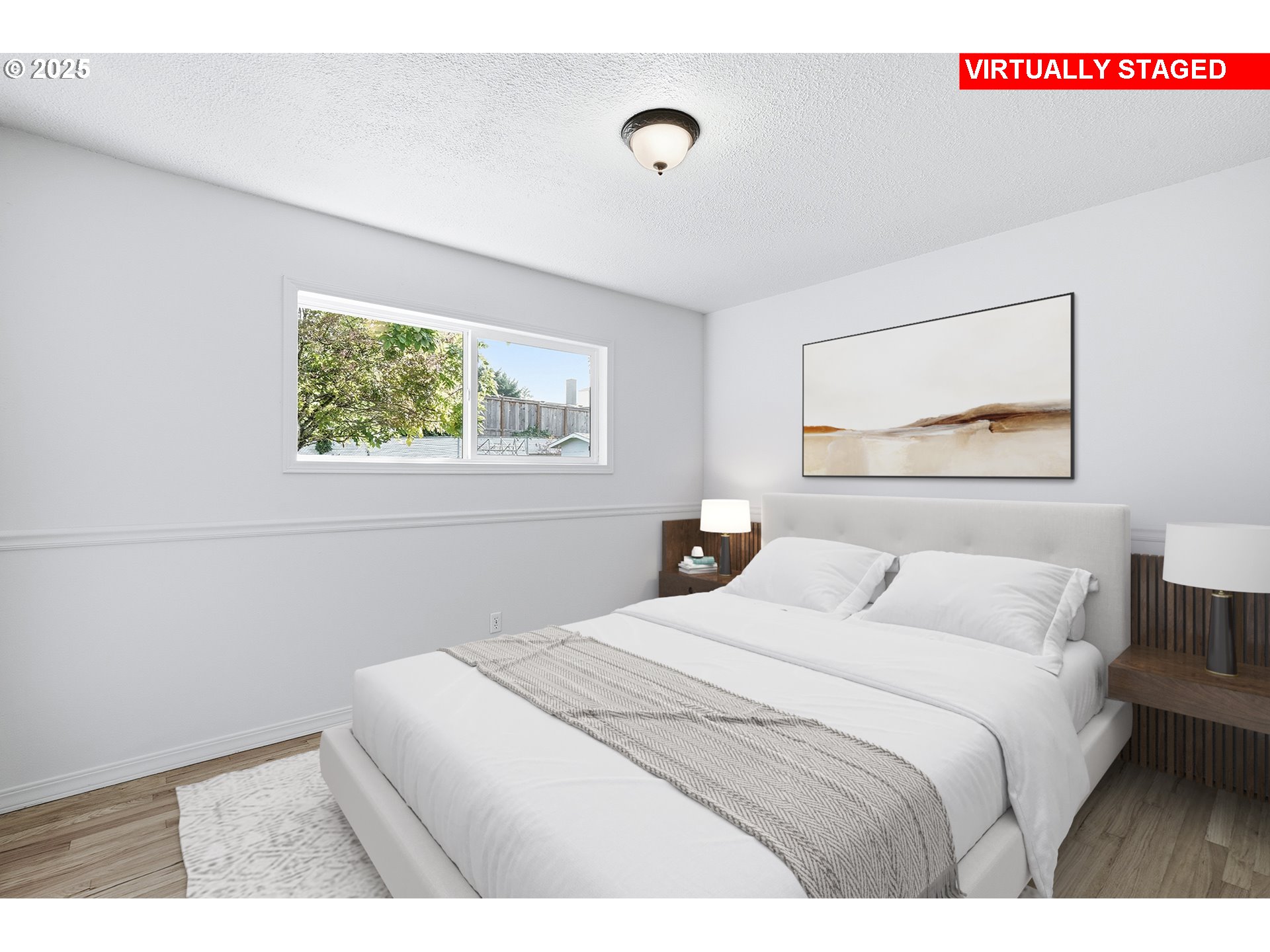 1422 Southeast 209th Avenue Gresham, OR 97030 - Photo 30 of 46 a bedroom with a bed and a painting on the wall