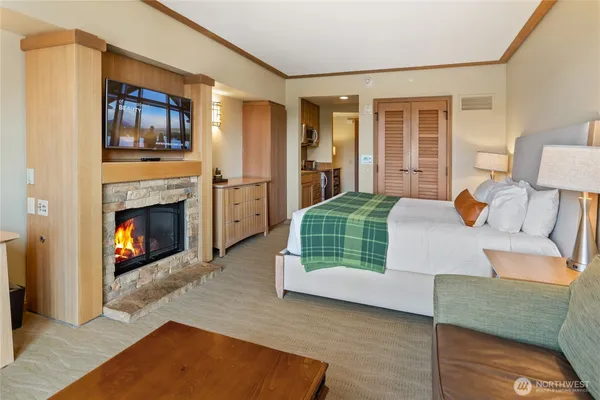 a bedroom with furniture and a couch
