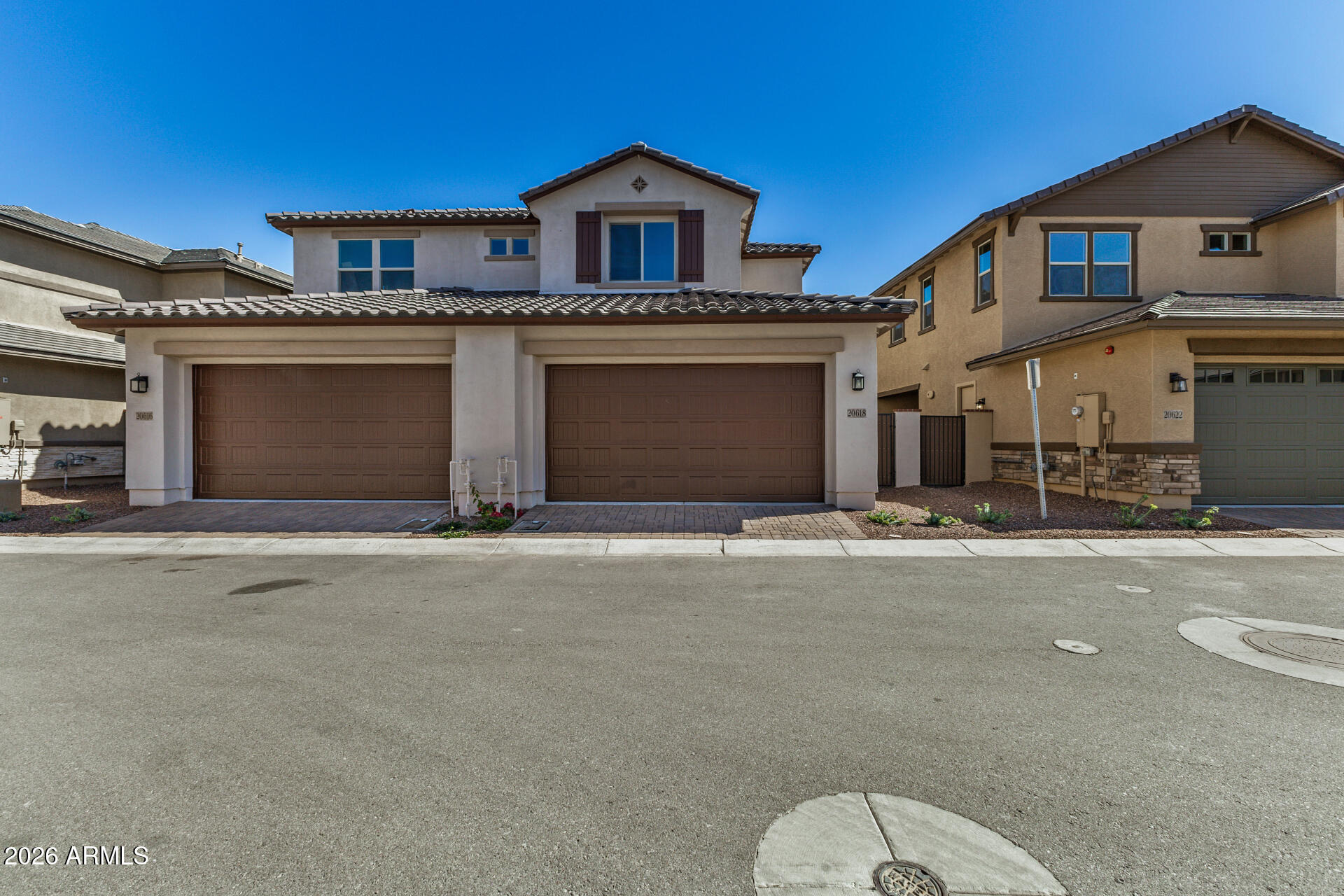 20618 West Thomas Road Buckeye, AZ 85396 - Photo 32 of 38 a front view of a house with a yard