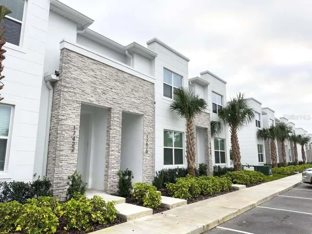 front view of a house with a small yard