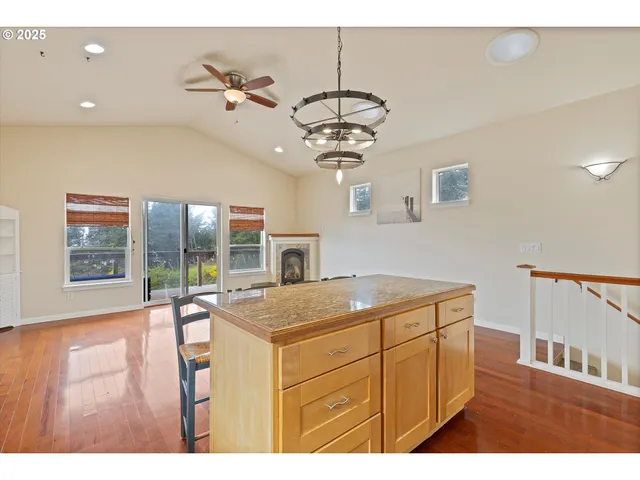 a kitchen that has a lot of cabinets in it