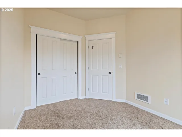 a view of balcony with wooden floor