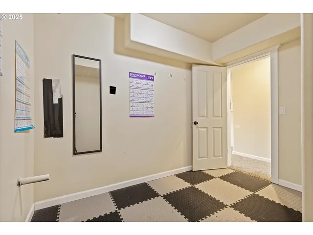 a view of balcony with wooden floor and outdoor seating