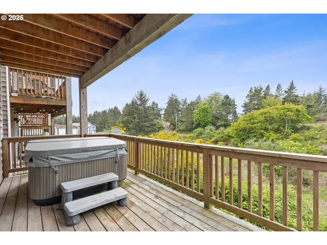 a front view of a house with large windows