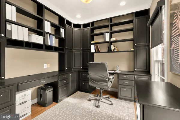 a view of a workspace with furniture