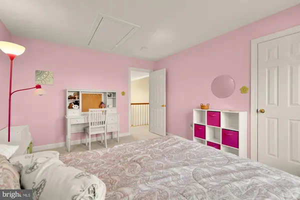 a bedroom with a bed and a closet