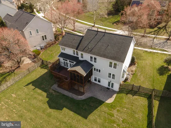 an aerial view of a yard with table and chairs