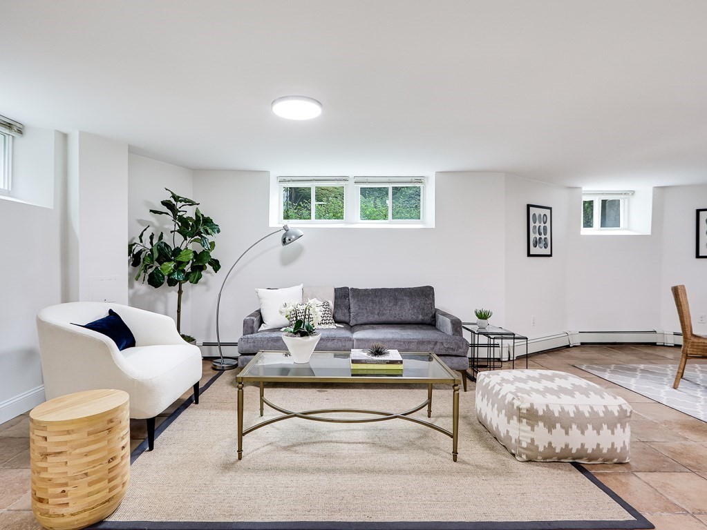 138 Middlesex Road, Unit B Newton, MA 02467 - Photo 2 of 16 a living room with furniture and a potted plant