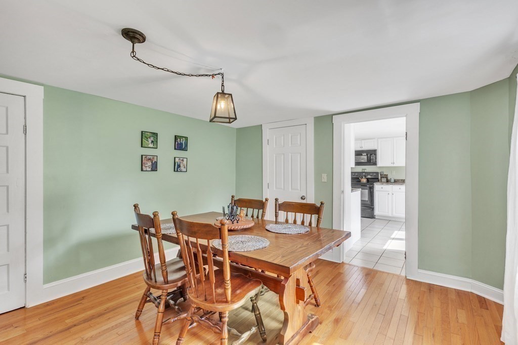 153 Pomeroy Meadow Road Southampton, MA 01073 - Photo 18 of 42 a view of a livingroom with furniture and wooden floor