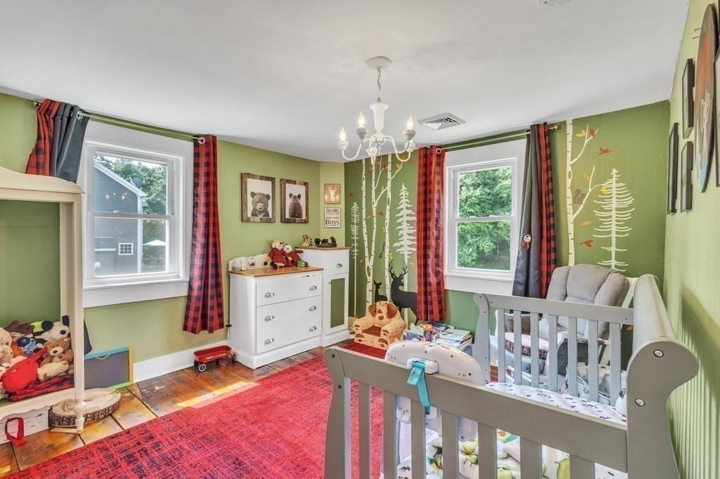 153 Pomeroy Meadow Road Southampton, MA 01073 - Photo 29 of 42 a bed room with a bed window and a dresser