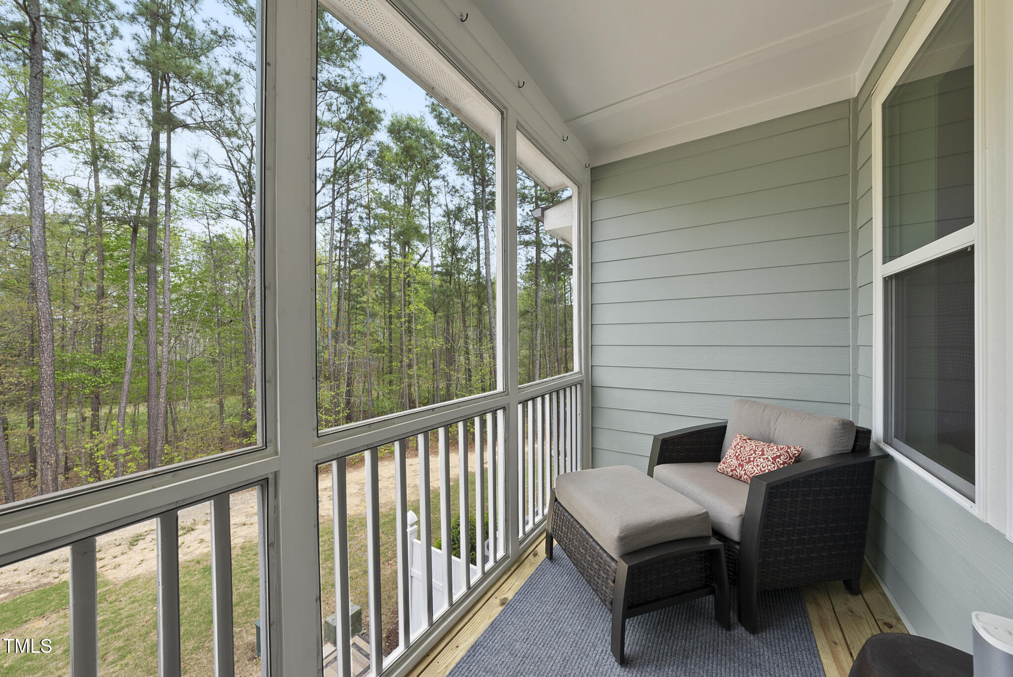 2564 Rambling Creek Road Apex, NC 27523 - Photo 13 of 43 Screen Porch off directly off the family room allows for you to enjoy the fresh breeze without worry of unwanted visitors