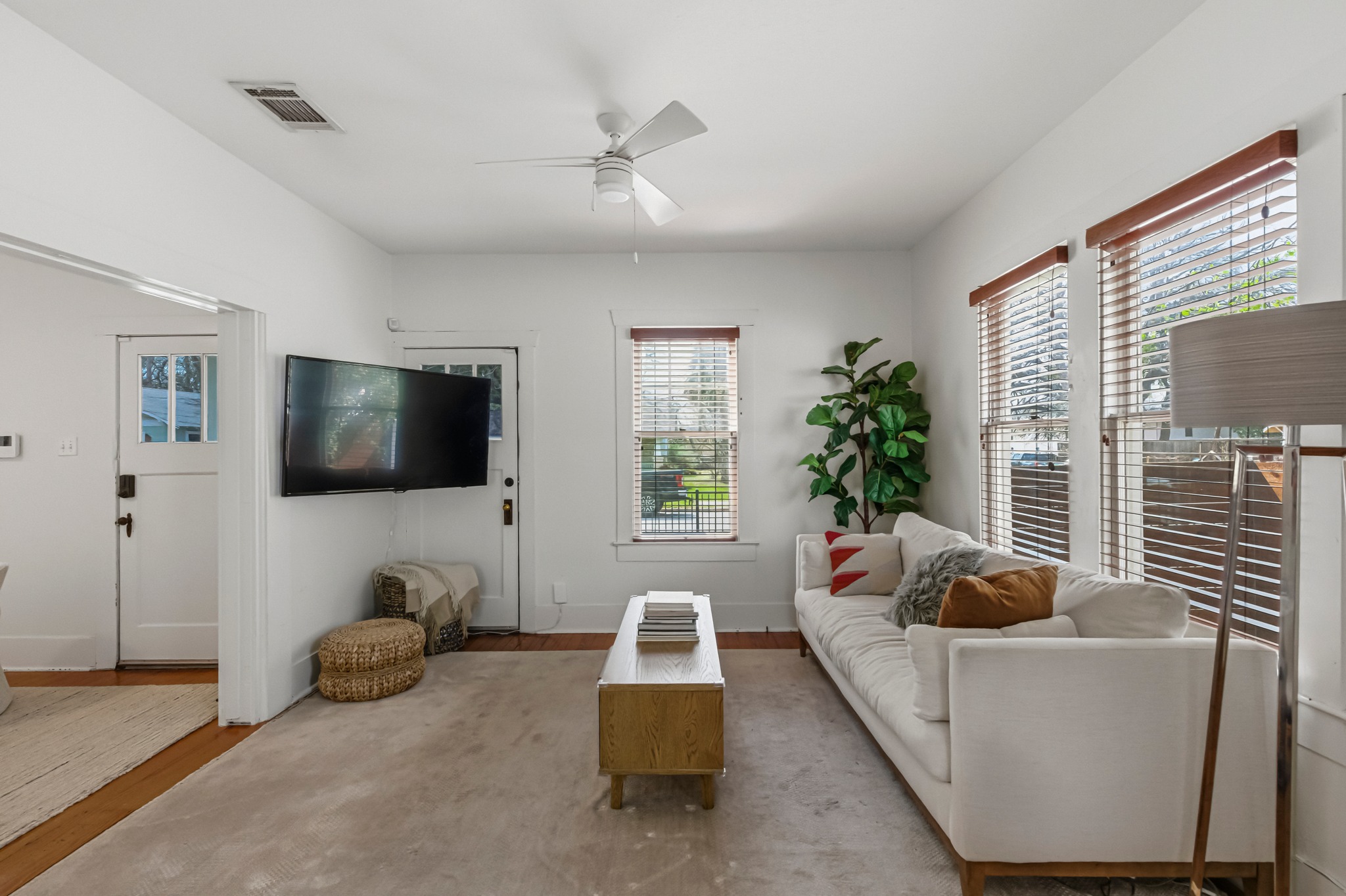 306 West 44th Street, Unit A Austin, TX 78751 - Photo 12 of 38 a living room with furniture and a flat screen tv