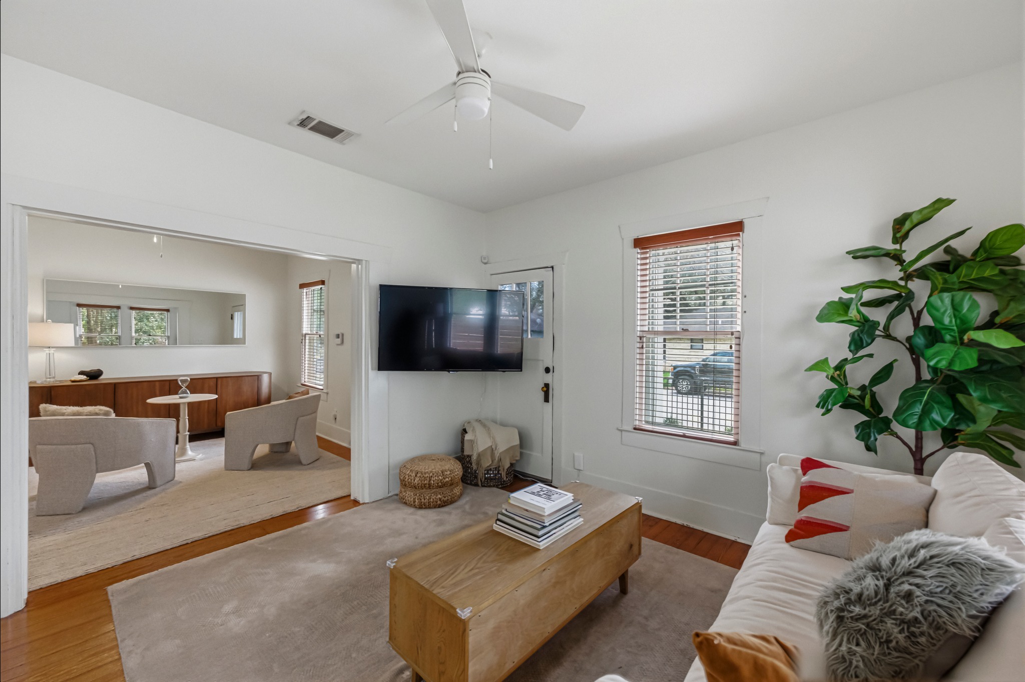 306 West 44th Street, Unit A Austin, TX 78751 - Photo 13 of 38 a living room with furniture and a flat screen tv