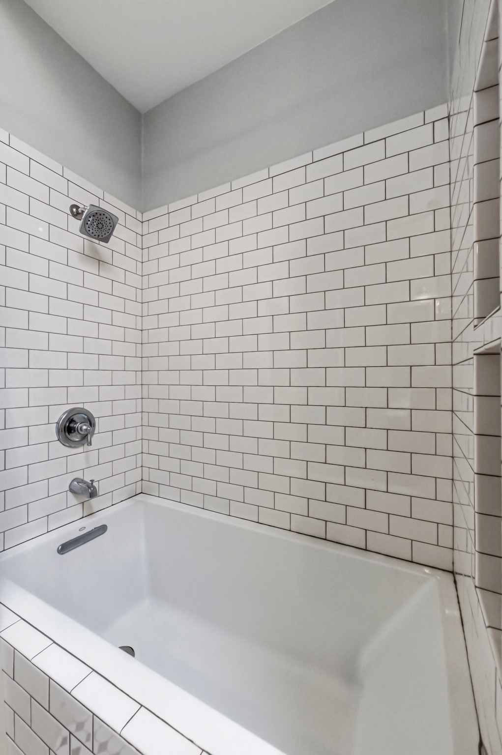306 West 44th Street, Unit A Austin, TX 78751 - Photo 26 of 38 a bathroom with a bathtub and a sink