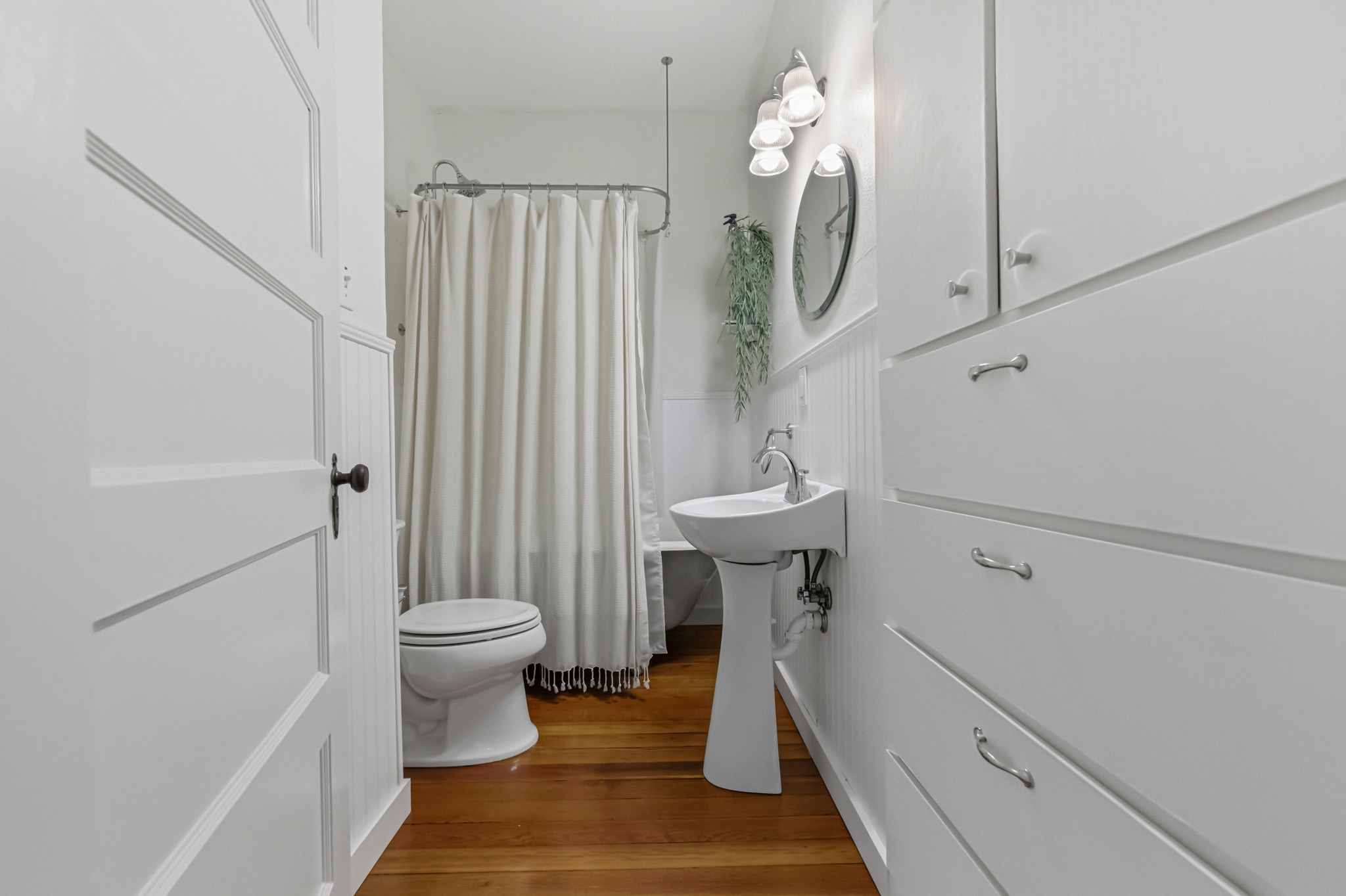 306 West 44th Street, Unit A Austin, TX 78751 - Photo 29 of 38 a bathroom with a sink toilet and shower