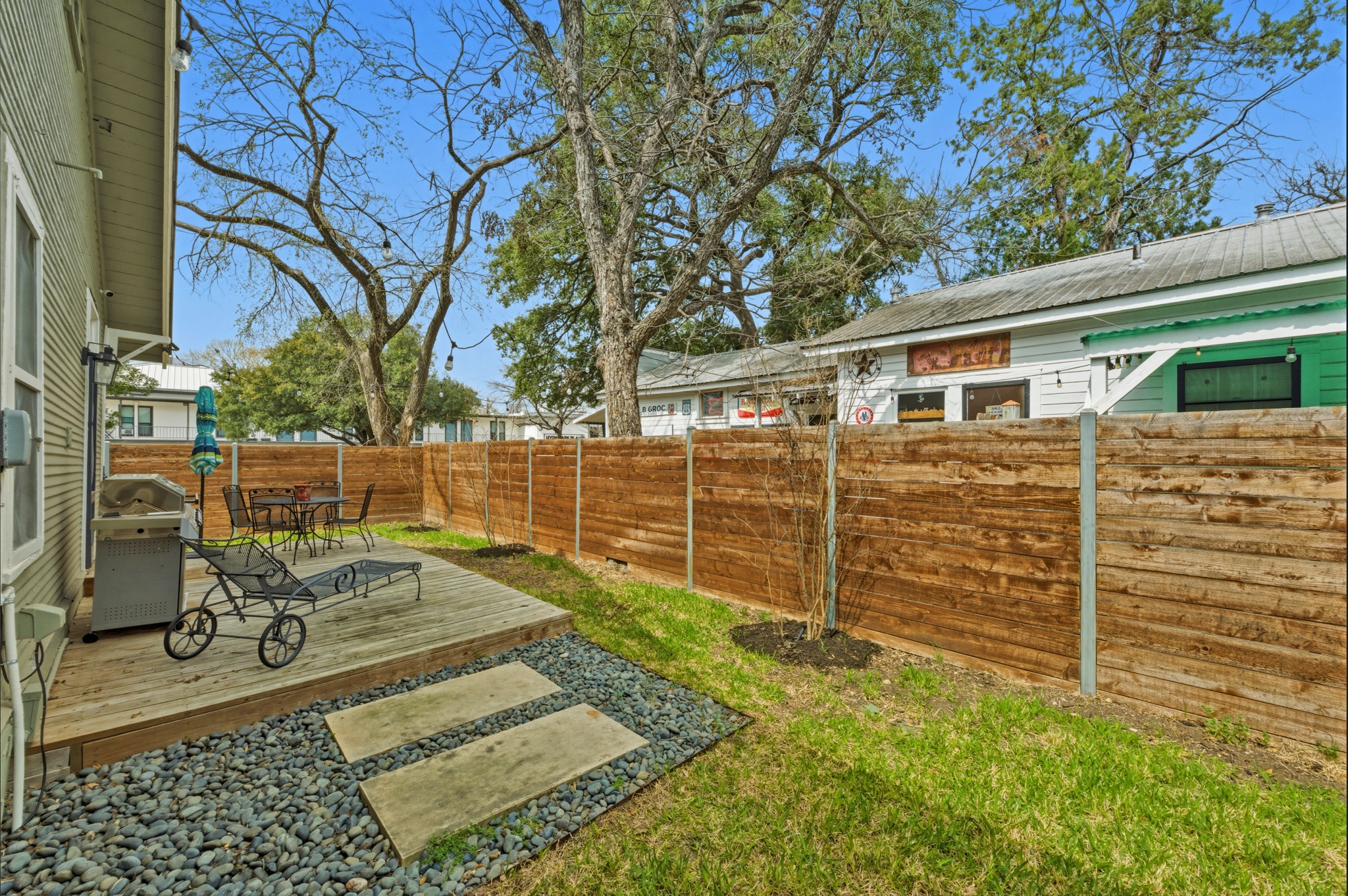 306 West 44th Street, Unit A Austin, TX 78751 - Photo 32 of 38 a view of a backyard of the house