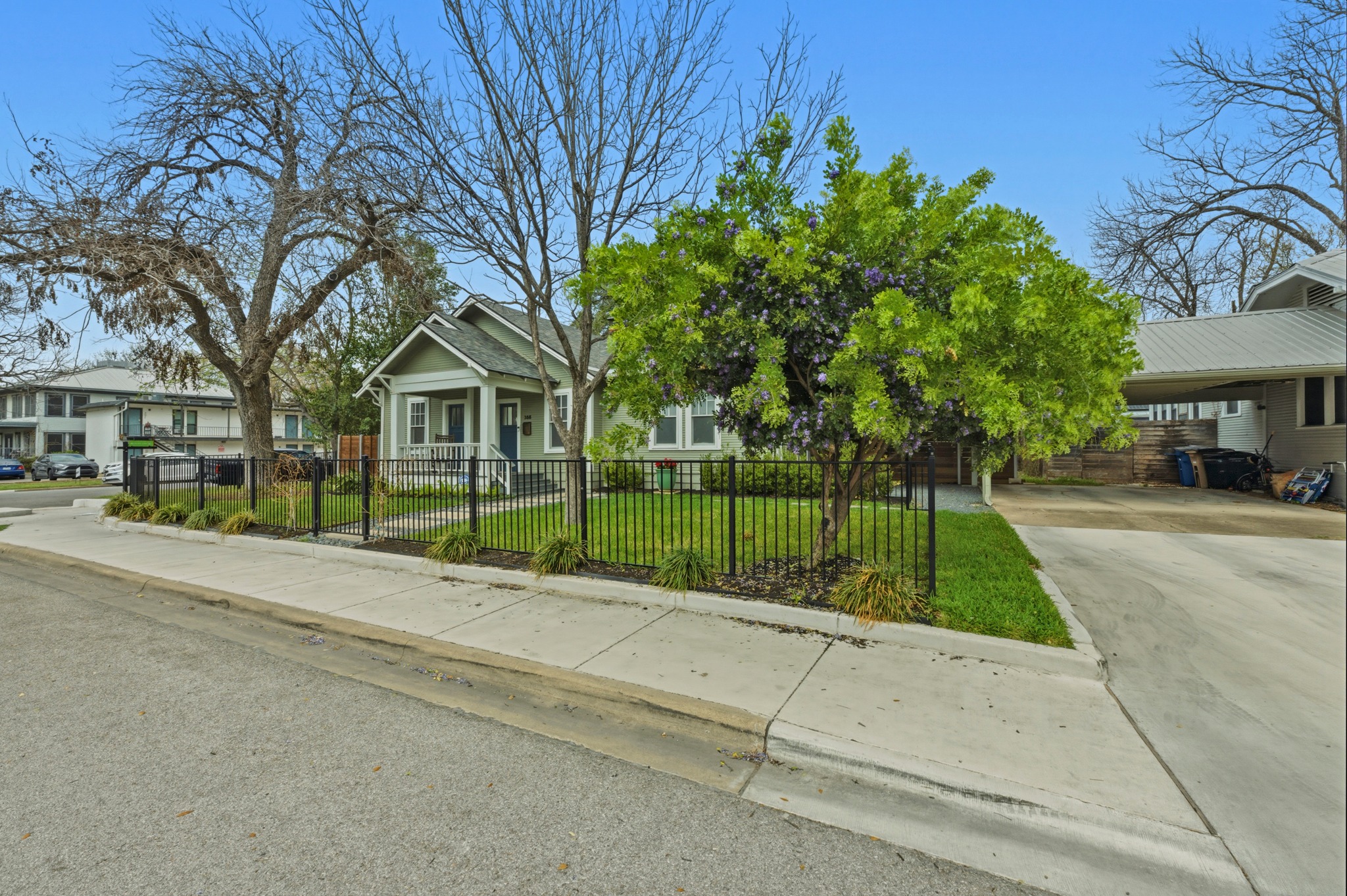 306 West 44th Street, Unit A Austin, TX 78751 - Photo 4 of 38 a view of a park with plants and large trees