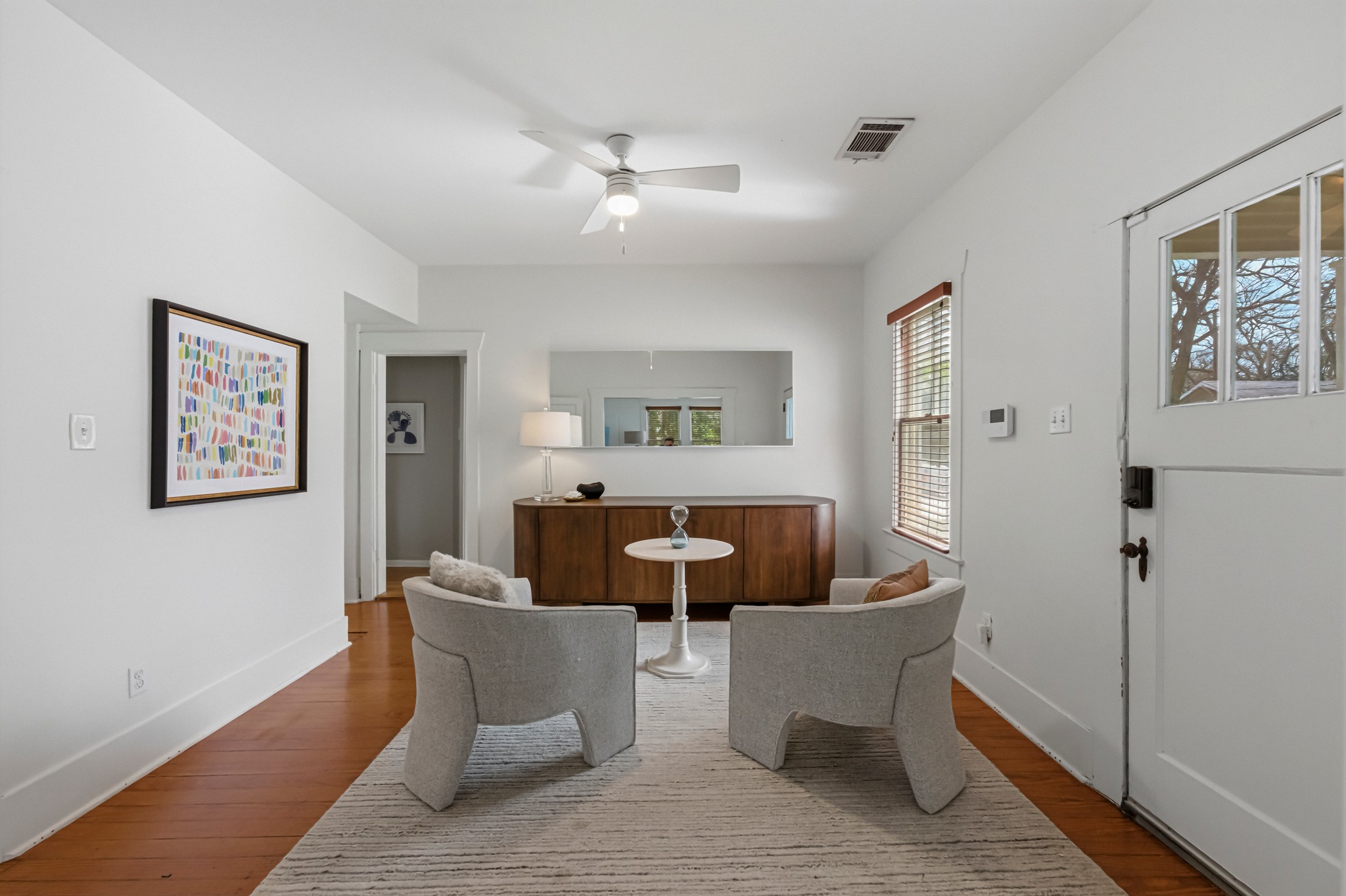 306 West 44th Street, Unit A Austin, TX 78751 - Photo 8 of 38 a living room with furniture and a large window
