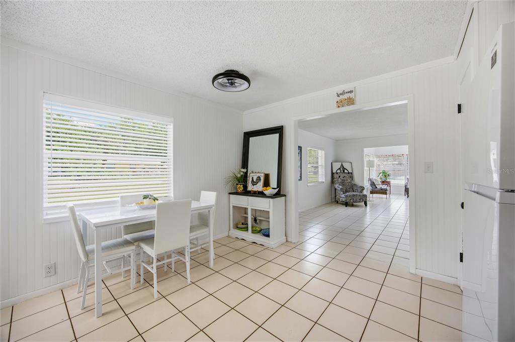113 Browns Road San Mateo, FL 32187 - Photo 15 of 36 a living room with furniture and a table