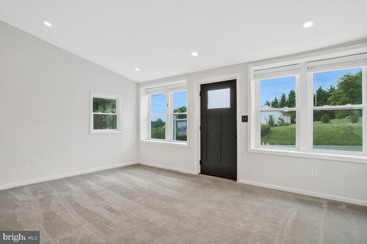 2985 Florence Road Woodbine, MD 21797 - Photo 9 of 34 front entry living with vaulted ceiling