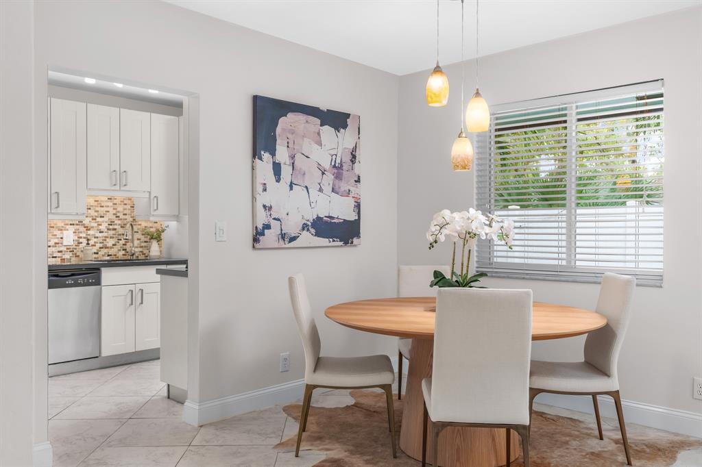 1502 Southwest 24th Street, Unit A Fort Lauderdale, FL 33315 - Photo 5 of 23 a dining room with furniture and window