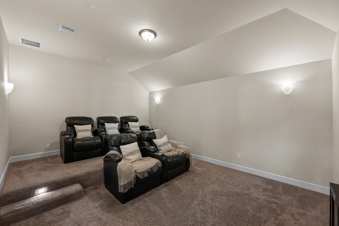 143 Pink Granite Boulevard Dripping Springs, TX 78620 - Photo 21 of 35 a living room with furniture and a window