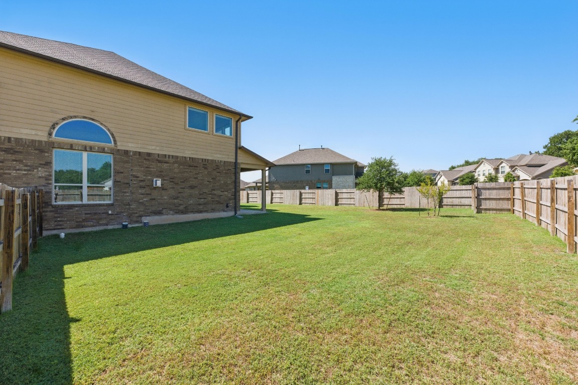 143 Pink Granite Boulevard Dripping Springs, TX 78620 - Photo 28 of 35 a view of outdoor space and yard