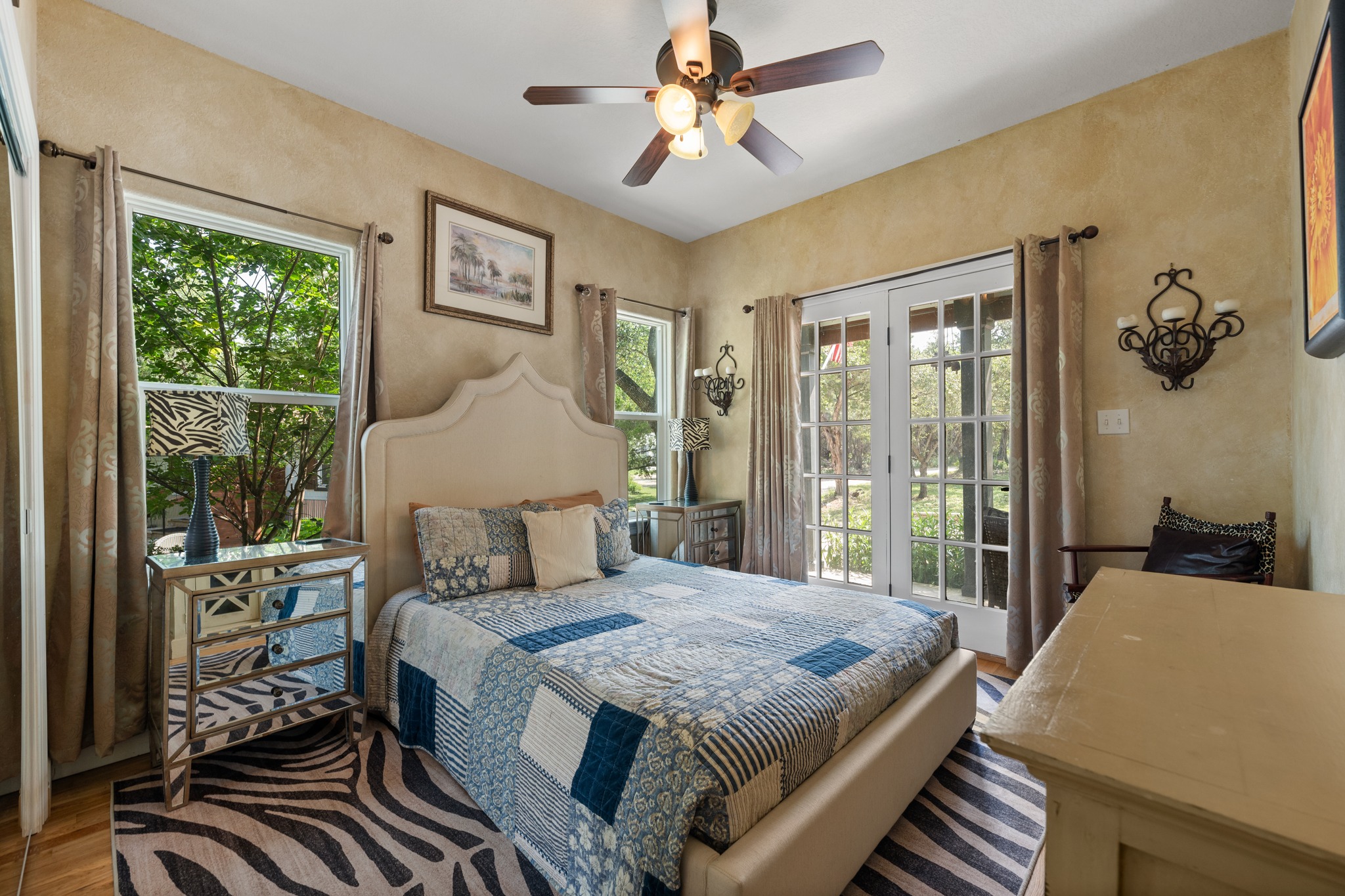 12932 Nutty Brown Road Austin, TX 78737 - Photo 10 of 40 Comfortable The Manor - bedroom offering a peaceful retreat with plenty of natural light.