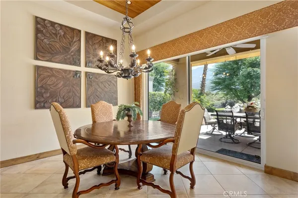 a kitchen with stainless steel appliances granite countertop a sink a oven and a refrigerator